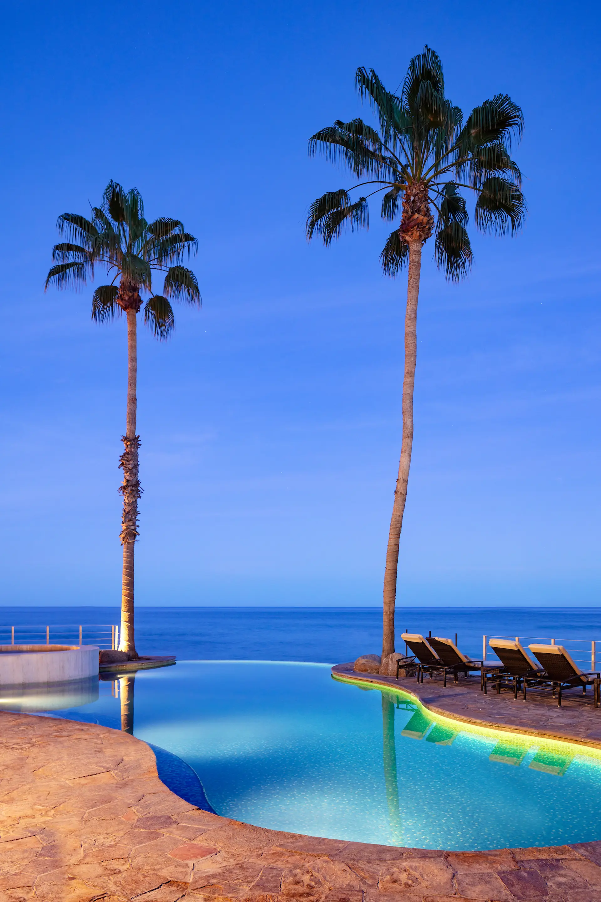 tropical-resort-pool-los-cabos-mexico